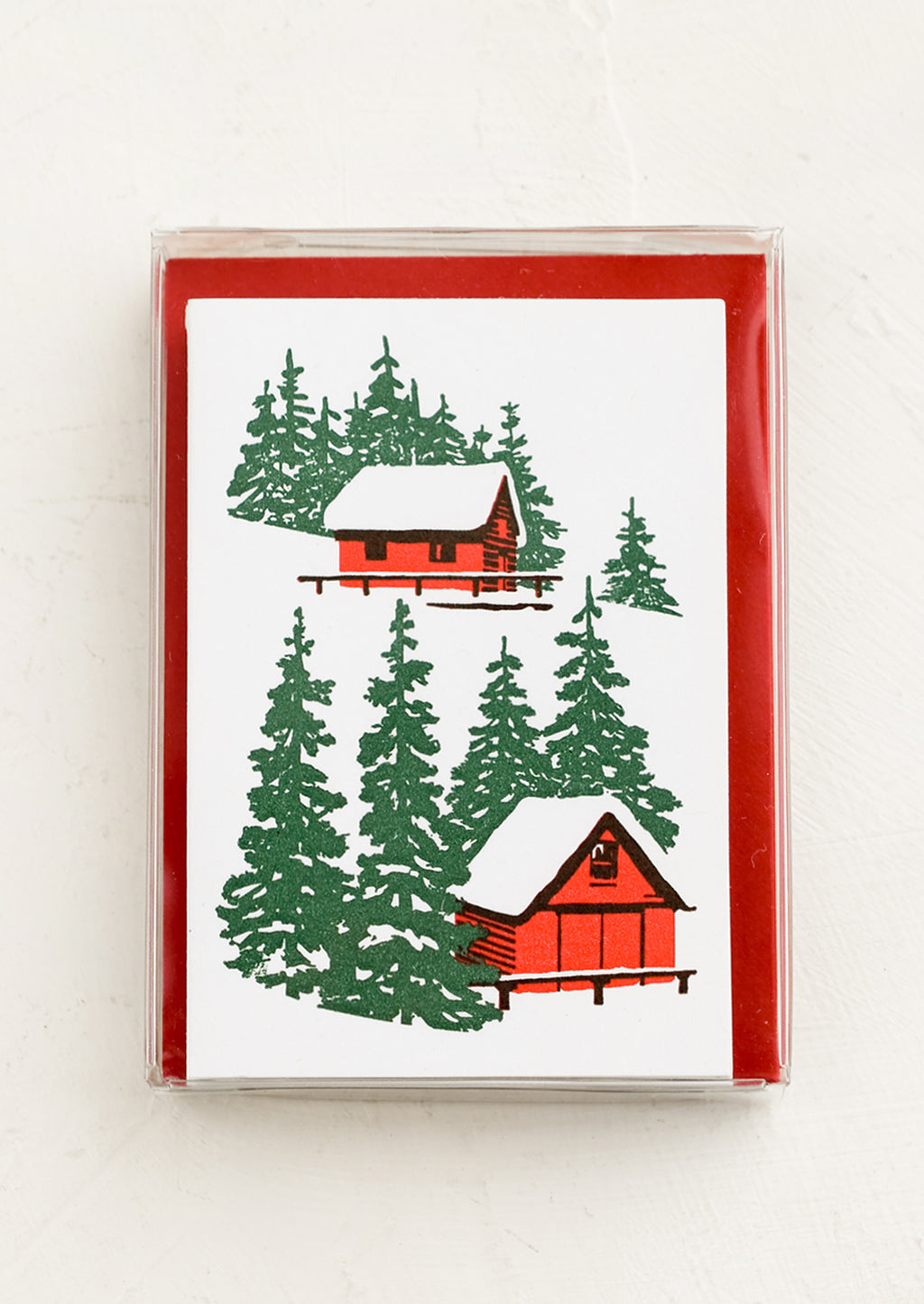 2: A set of letterpress mini enclosure cards with cabin in the woods print and red envelopes.
