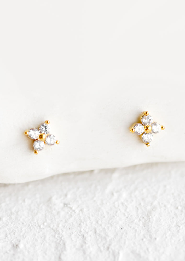 A pair of small stud earrings in crystal flower design.