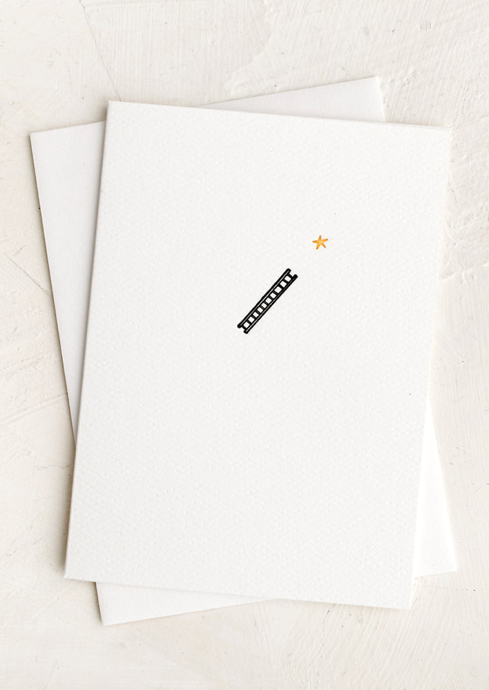 Ladder to Stars: A plain white card with small ladder with star icon at front.