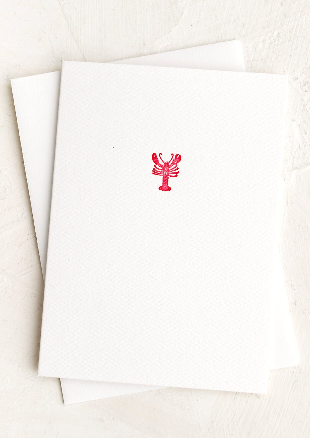 Lobster: A plain white card with small red lobster at front.