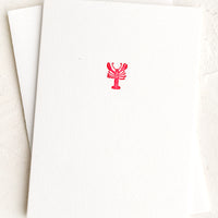 Lobster: A plain white card with small red lobster at front.