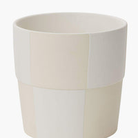 Large: A large cream and white checker patterned planter pot.