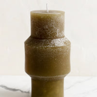 Medium (Plateau) / Olive: A medium carved pillar candle with waxy finish in olive.