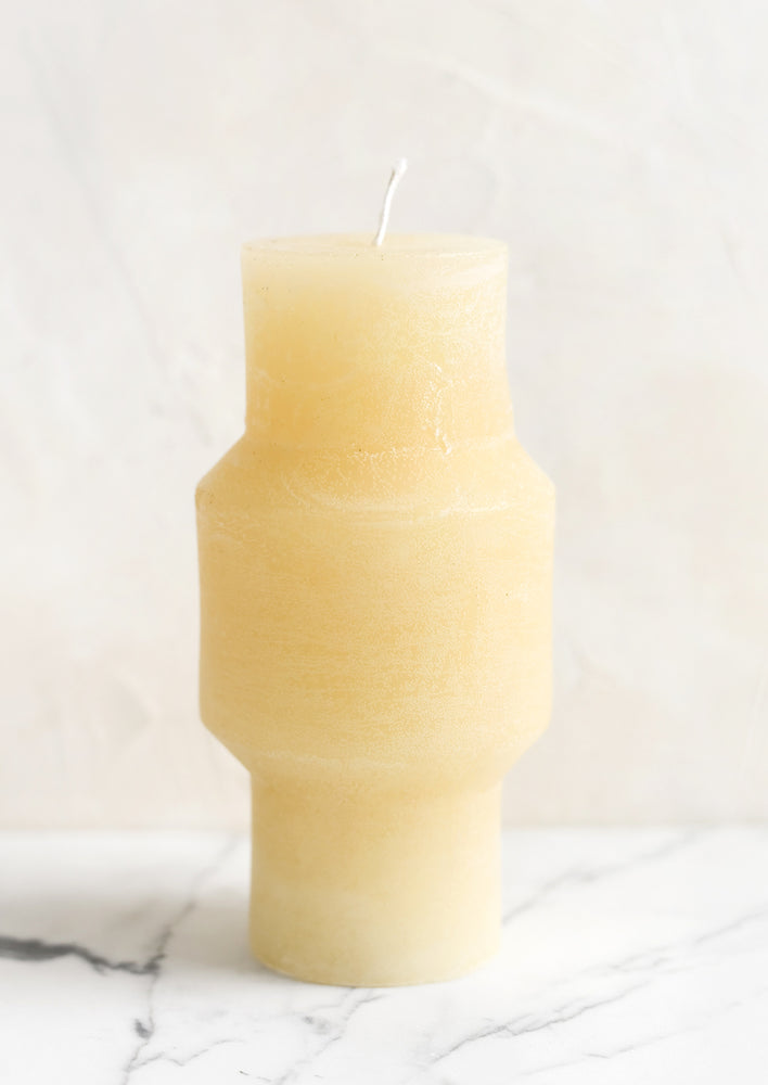 Medium (Plateau) / Vanilla: A medium carved pillar candle with waxy finish in vanilla.