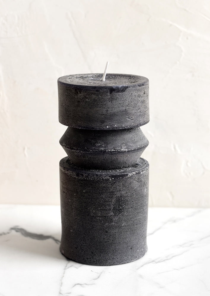 Medium (Ridge) / Black: A medium carved pillar candle with waxy finish in black.