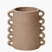 2: A raw sand clay vase with decorative loops all the way down both sizes.
