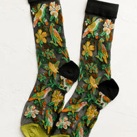 1: A pair of sheer black socks with tropical parrot print.