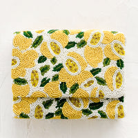 Lemon Multi: A beaded box-shaped clutch with lemon citrus print.