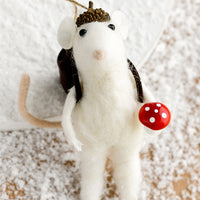 1: A felted holiday ornament of a mouse holding a mushroom.
