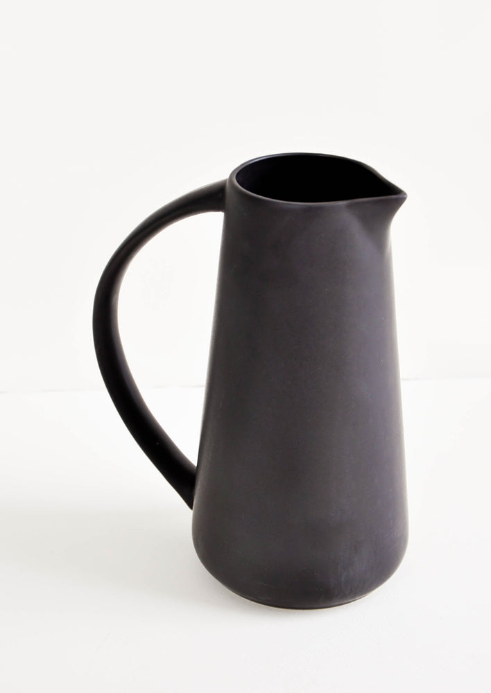Matte black pitcher with oversized handle.