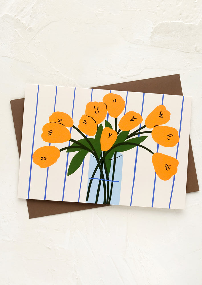 A greeting card with illustration of yellow tulips in a vase.
