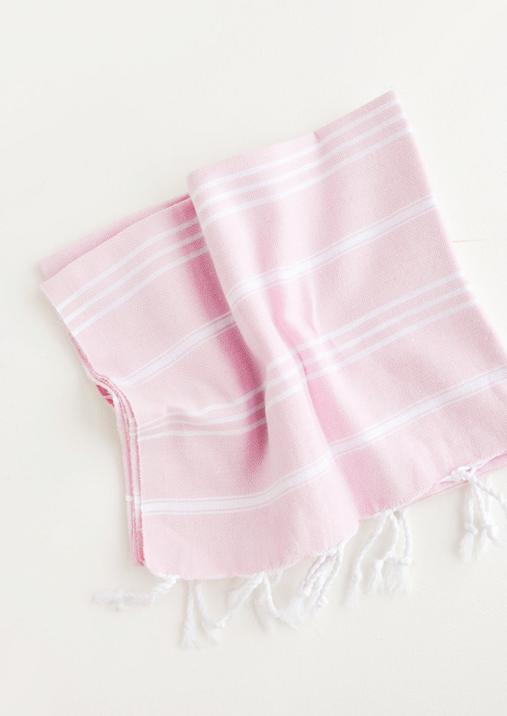 Pink / Hand Towel: Cotton towel with white stripes in pink, twisted fringe on ends