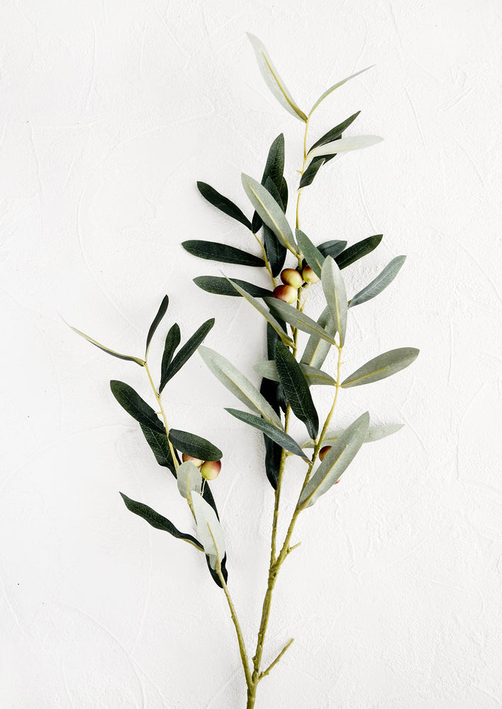 Realistic looking faux olive branch with leaves and ripening olives