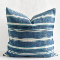 1: A square throw pillow in vintage indigo stripe fabric.