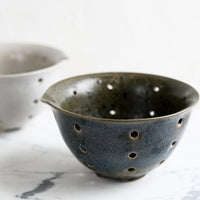 2: Stoneware ceramic colanders.