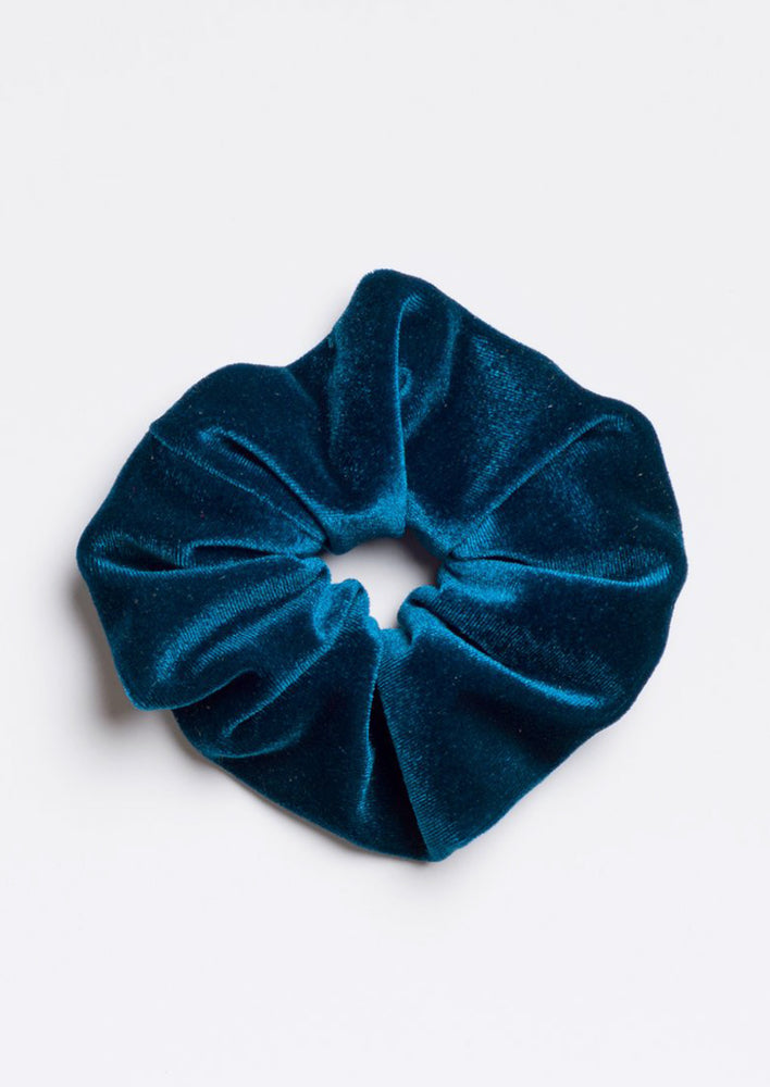 A velvet scrunchie in blue.