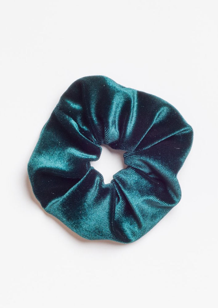 A velvet scrunchie in emerald.