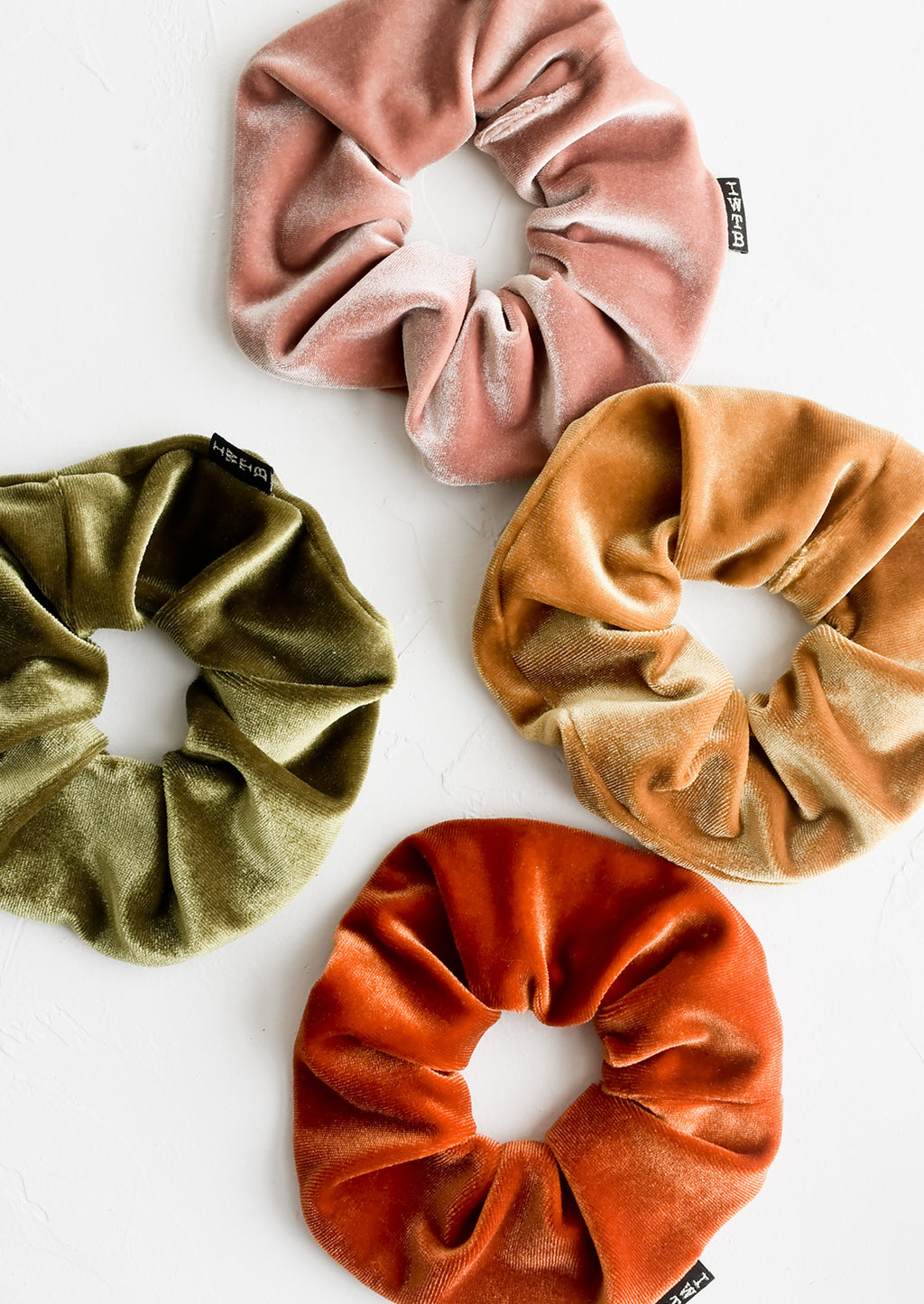 1: Velvet scrunchies in assorted colors.