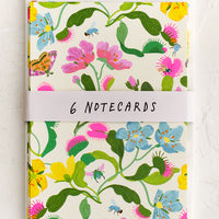 2: A set of notecards with colorful fly trap floral print.
