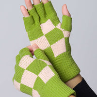 Kiwi Checker: A pair of knit fingerless gloves in kiwi and blush checker.