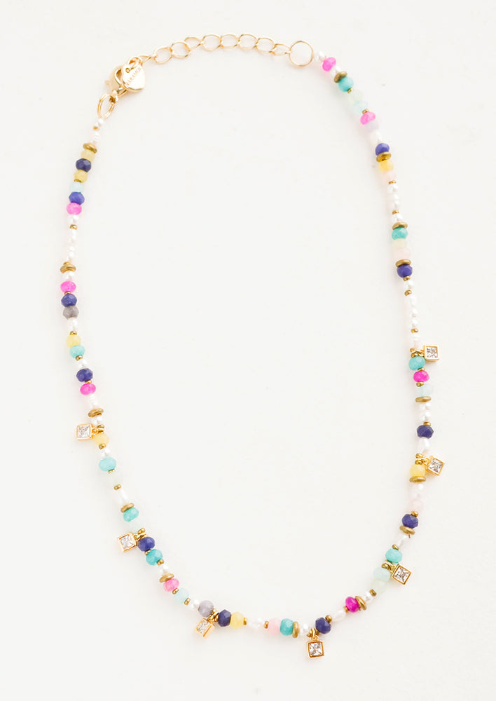 Beaded necklace with pearl and colored stone beads, accented with square crystal stations