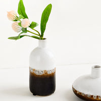 2: A ceramic bud vase in white and brown distressed glaze with a gomphrena stem.