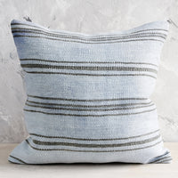1: A square throw pillow in vintage light blue hemp with charcoal stripes.