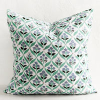 1: A block print pillow in mint and periwinkle botanical print.