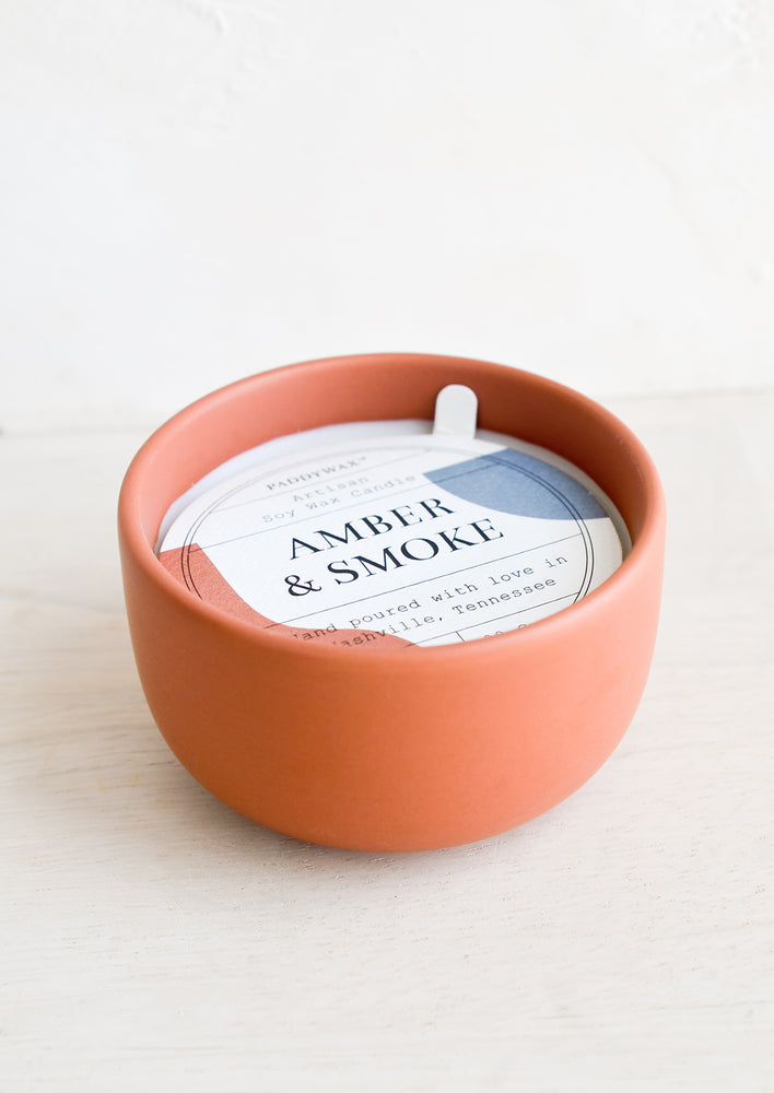 Amber & Smoke: Small scented candle in colorful red ceramic vessel