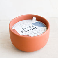 Amber & Smoke: Small scented candle in colorful red ceramic vessel