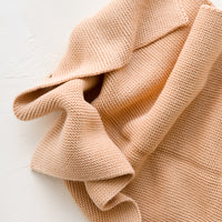 Nougat: A knit cotton dish towel in dusty peach.
