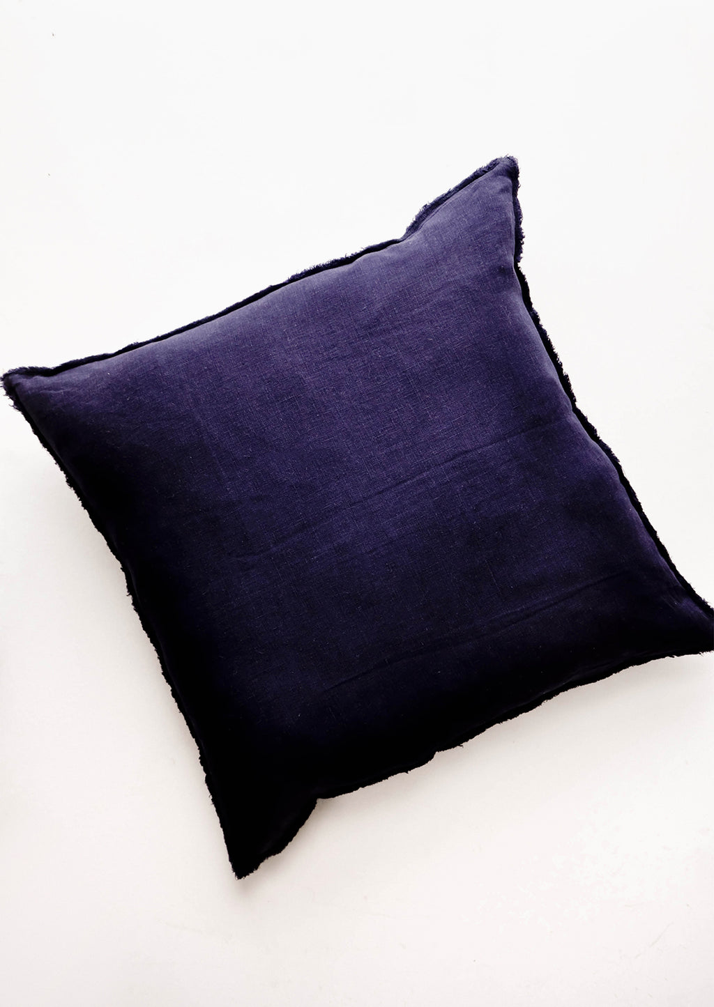 Midnight Blue: Square Linen Throw Pillow with Frayed Trim in Midnight Navy - LEIF