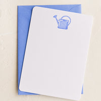 Watering Can: A white notecard with blue watering can letterpress printed at top, with blue envelope.