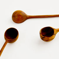 3: Detail of basins on hand carved wooden spoons