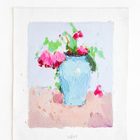 1: A painterly still life of pink flowers in a blue vase.
