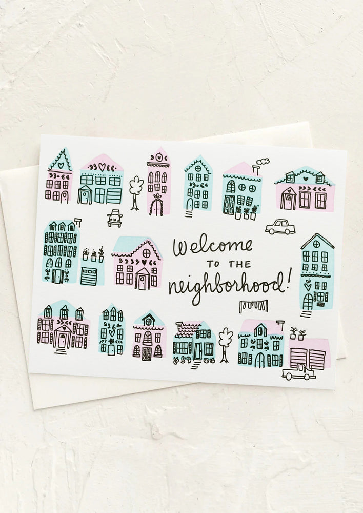 1: A card with illustrations of houses and text reading "Welcome to the neighborhood!".