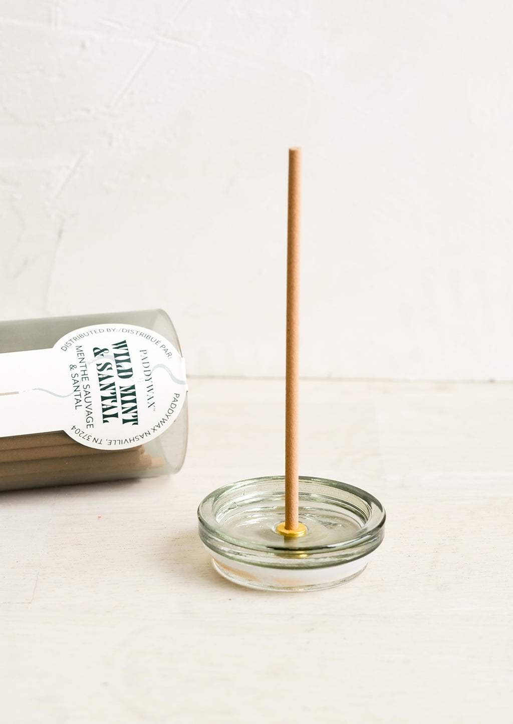 2: An incense jar with holder built into jar lid.