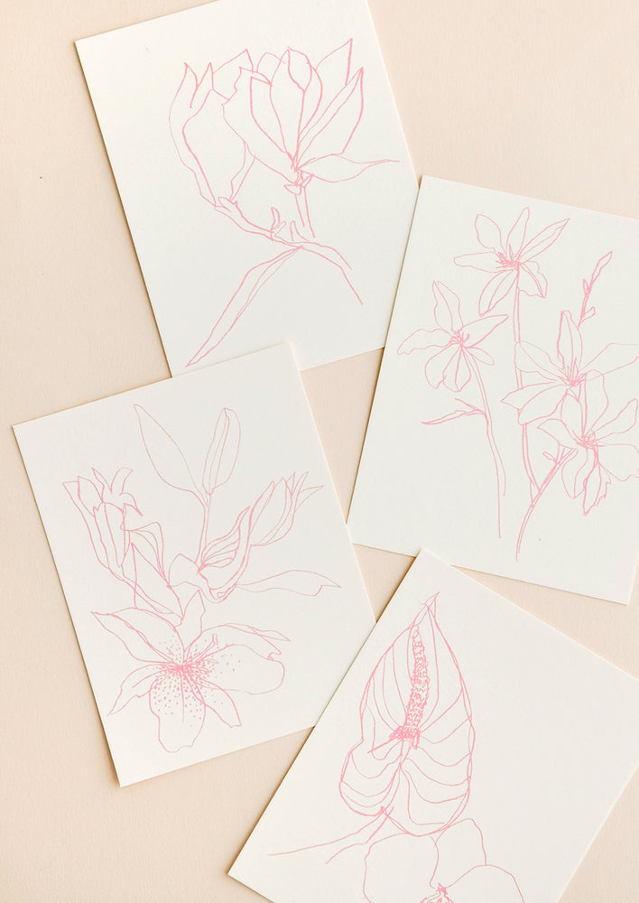 Product show showing four styles of floral drawing notecard.