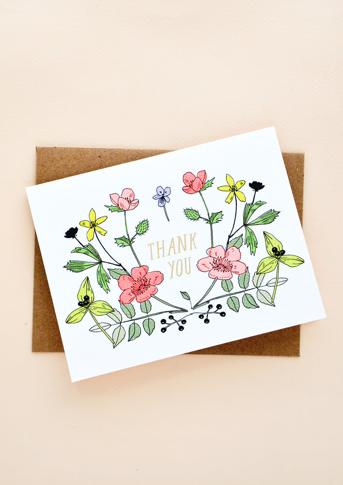 1: Greeting card with colorful flowers and "Thank you" at center in golden letters