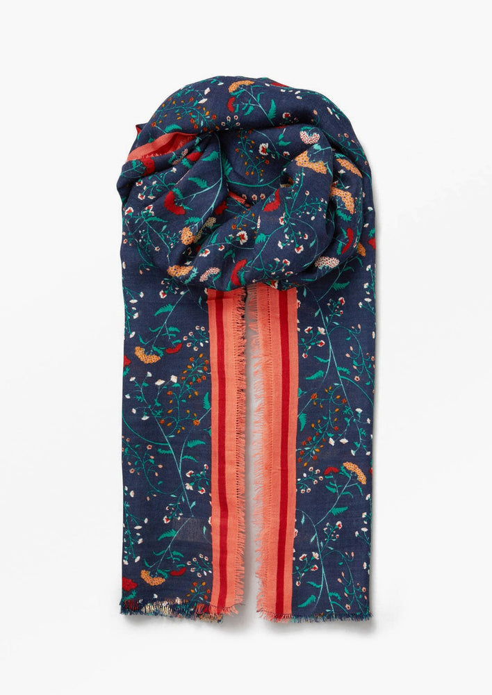 Navy Multi: A navy blue and red scarf in wildflower print.
