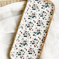 1: A rectangular wooden tray with white strawberry enamel pattern.