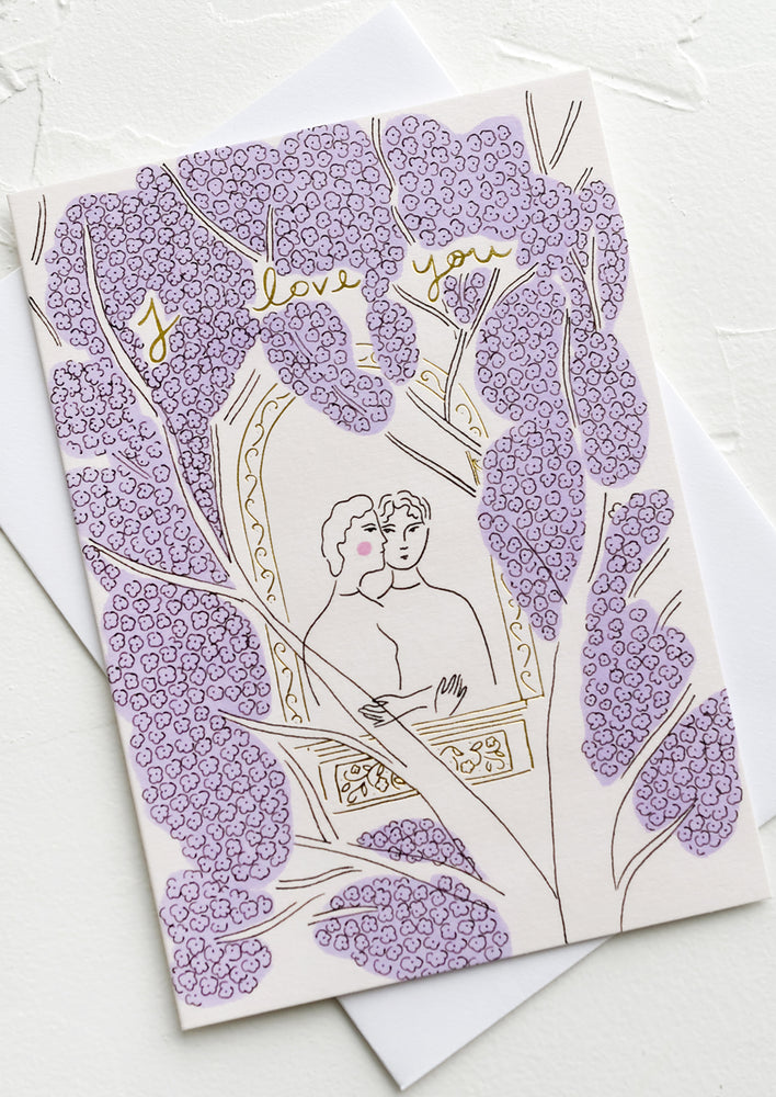 A greeting card with illustration of two people embracing in a window surrounded by wisteria.