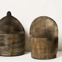 1: Two vintage looking wooden wall baskets in slightly different shapes.