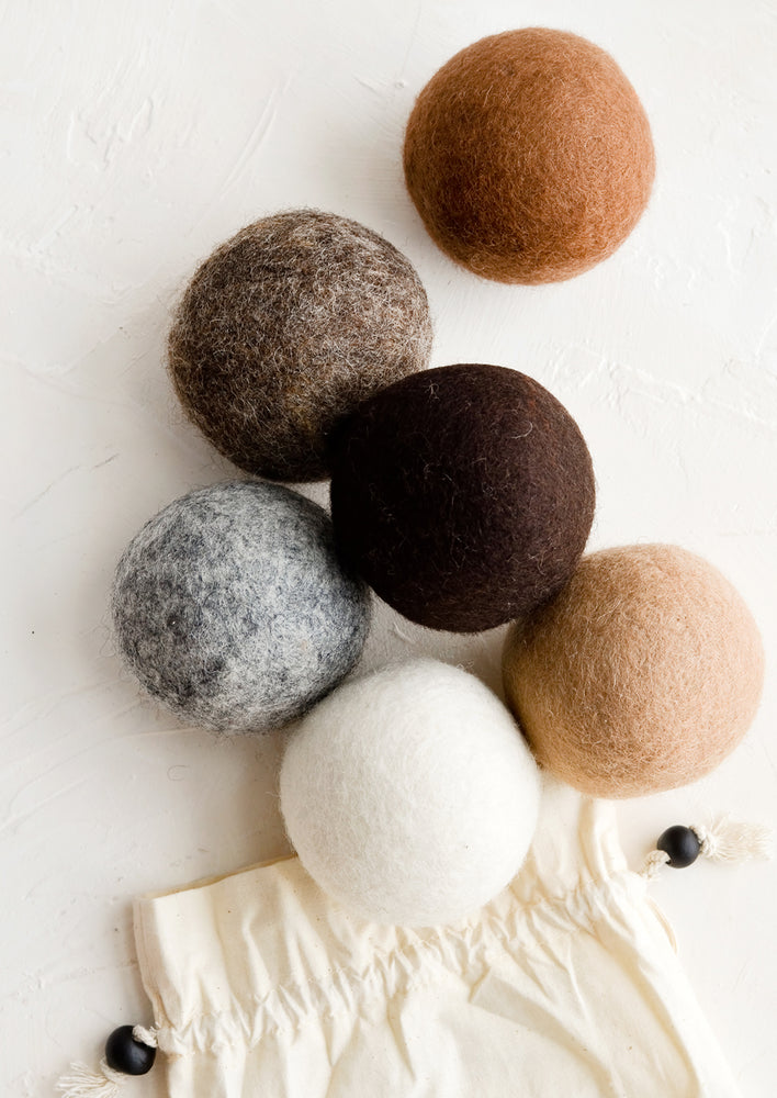 Tan Multi: A set of six wool dryer balls in various shades of brown.