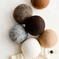 Tan Multi: A set of six wool dryer balls in various shades of brown.