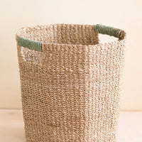 Seafoam: An octogonal natural basket wageith s wrapped cutout handle.