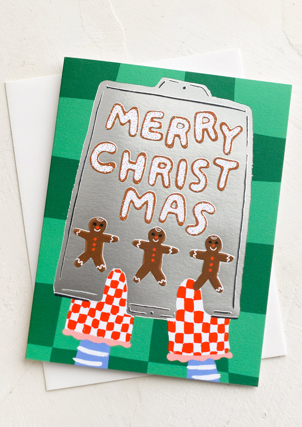 Single Card: A card with illustration of gingerbread men cookies on a tray, text reads "Merry Christmas".