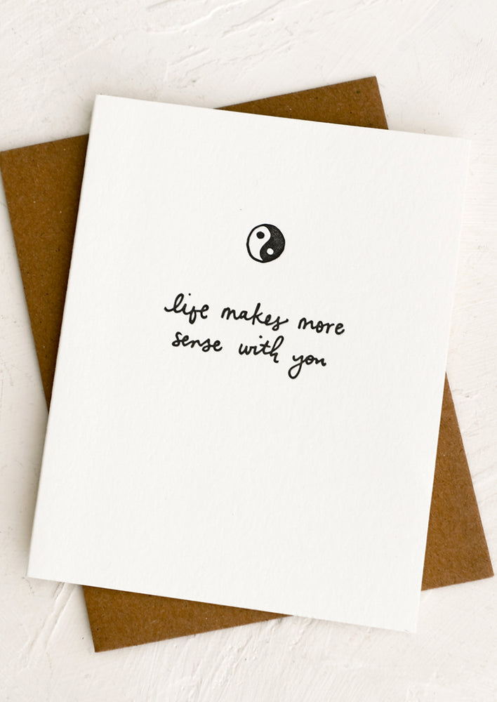 A card with image of yin yang, text reads "Life makes more sense with you".