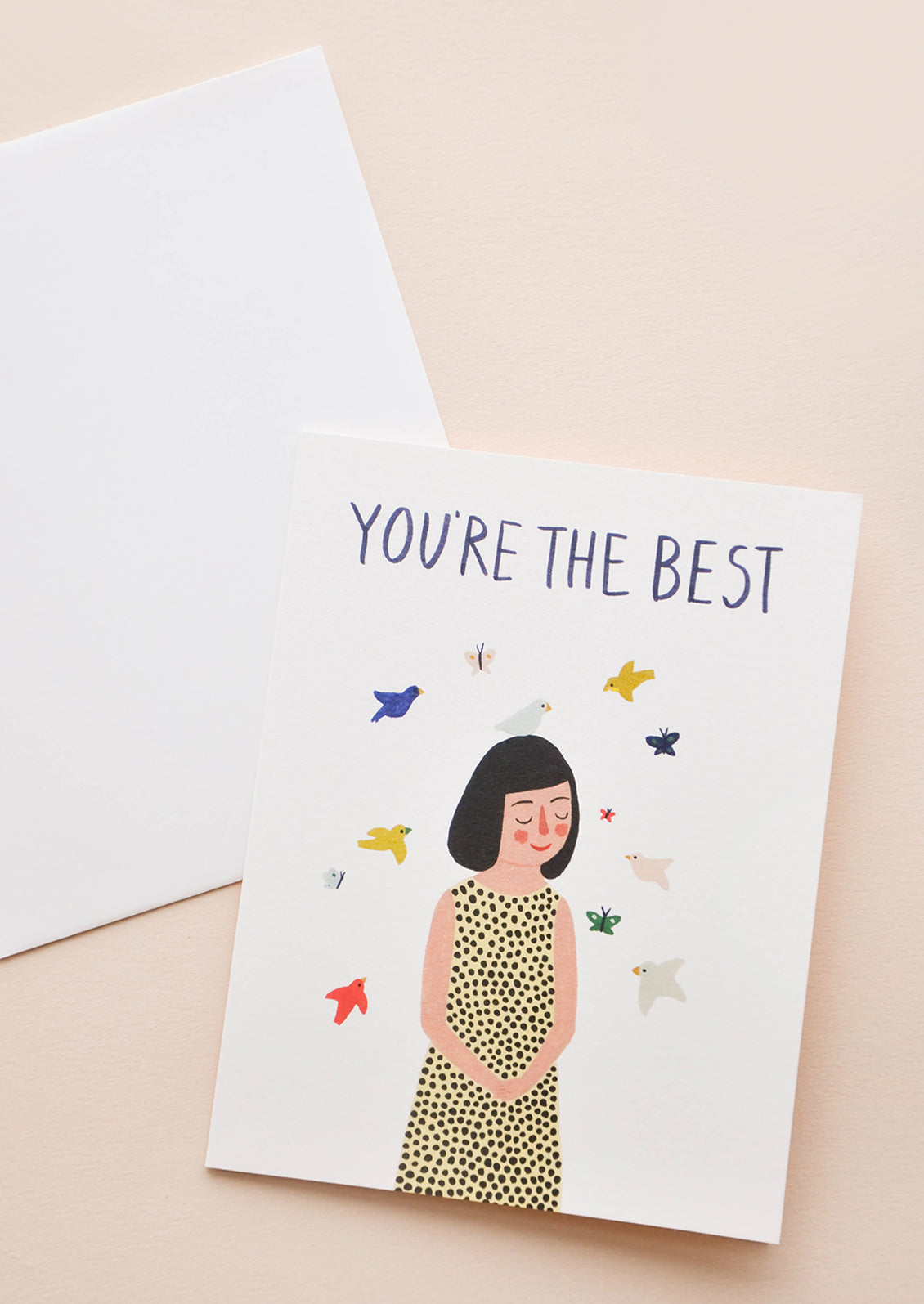 Greeting card with illustration of women with birds floating around her head