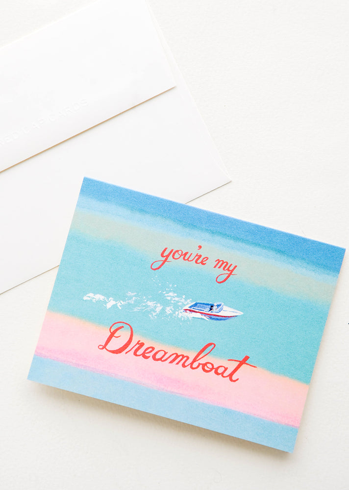 1: Greeting card with image of a boat speeding through the ocean, red cursive text reads "You're My Dreamboat"